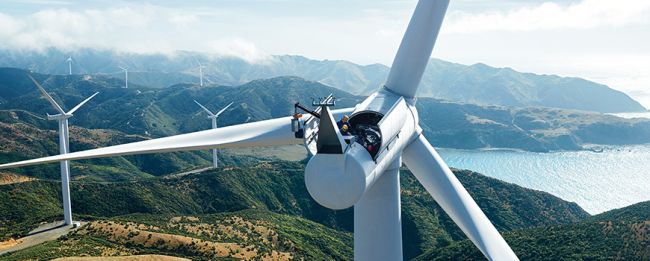 Civil engineers working on wind turbine