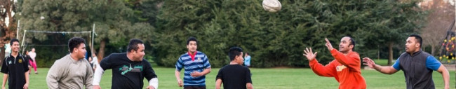 Pacific migrants play a casual game of touch-rugby