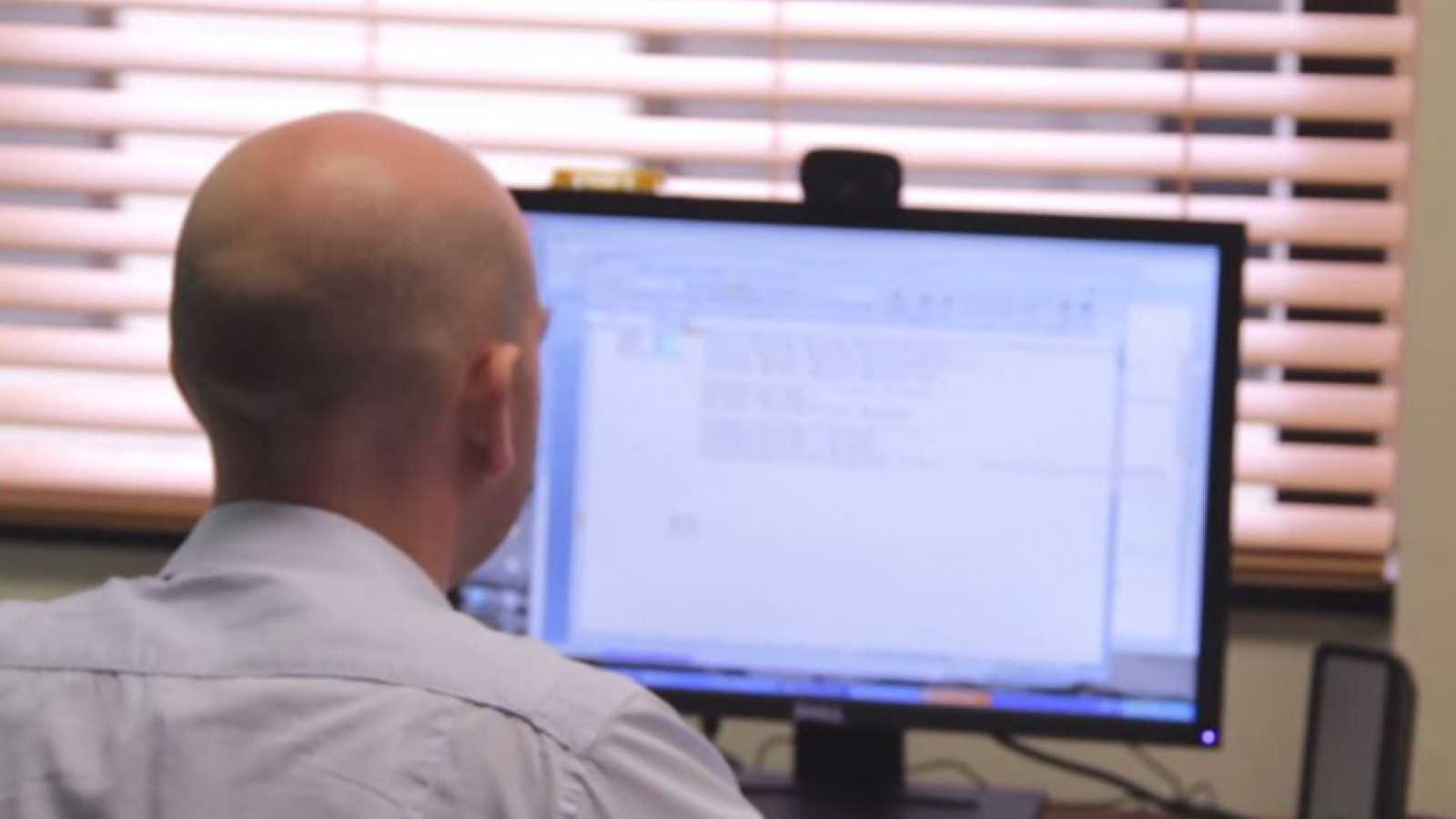 Man looking at computer screen