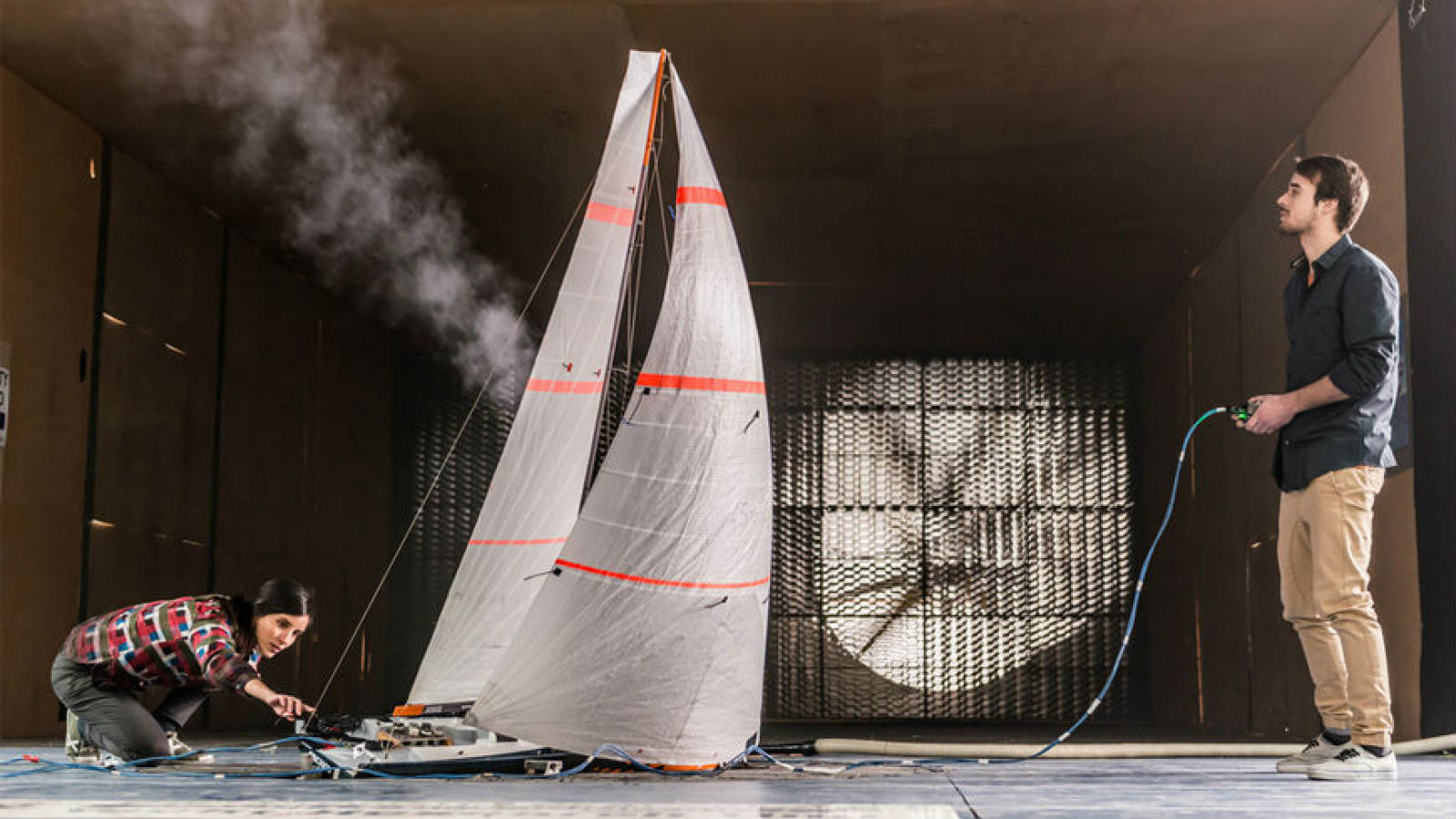 Woman and man working on yacht project