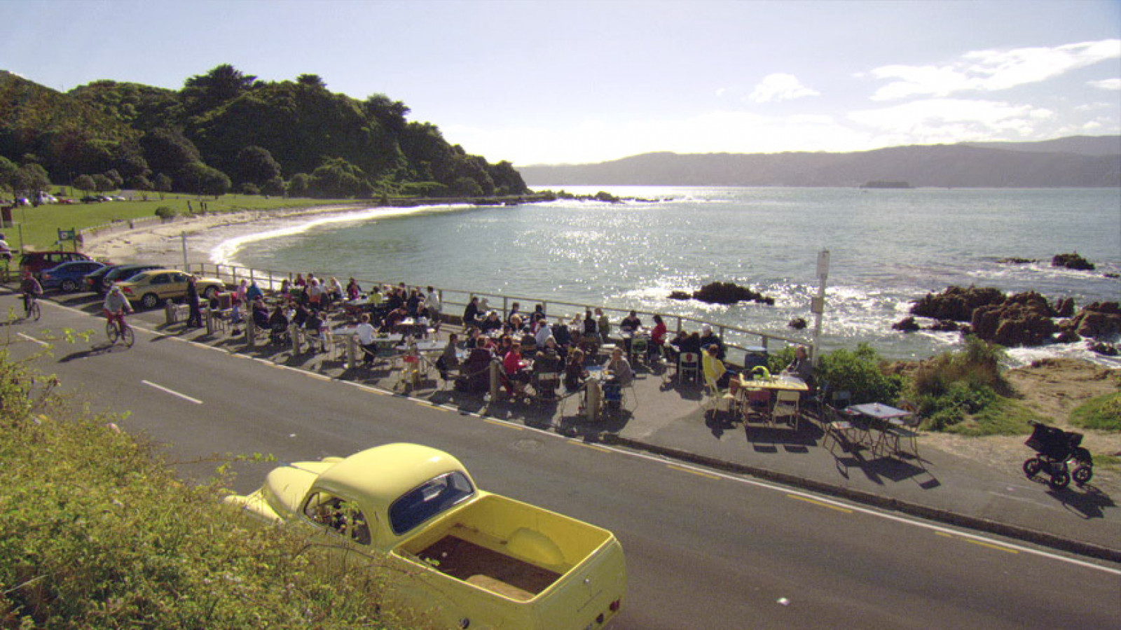 People socialising by beach