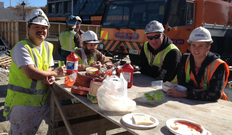 Construction workers eating lunch