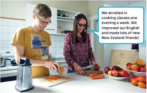 Two people in kitchen preparing food, with speech bubble talking about how cooking classes improved their English
