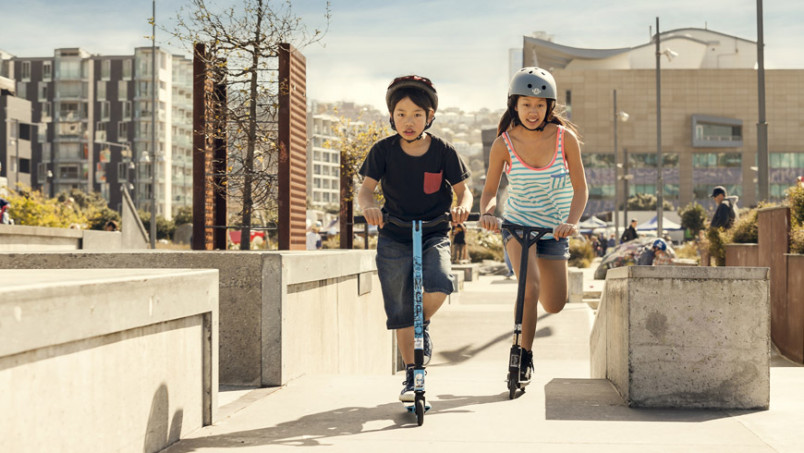 Kids on scooters in New Zealand