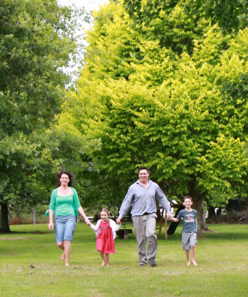 family walking through park