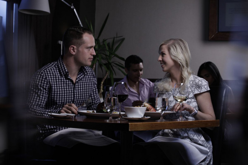 [image] couple having dinner