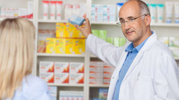 Pharmacist helping a customer