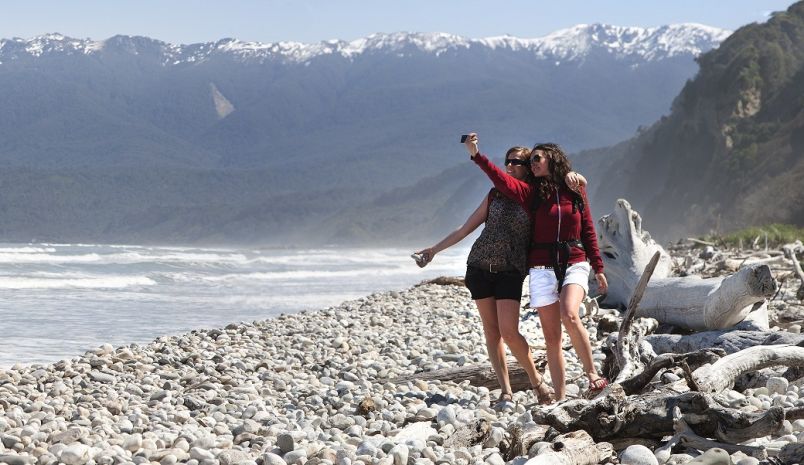 Getting a photo on a West Coast beach